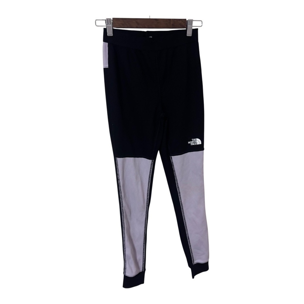 The North Face Kids Black and light purple thermal
Pants 12